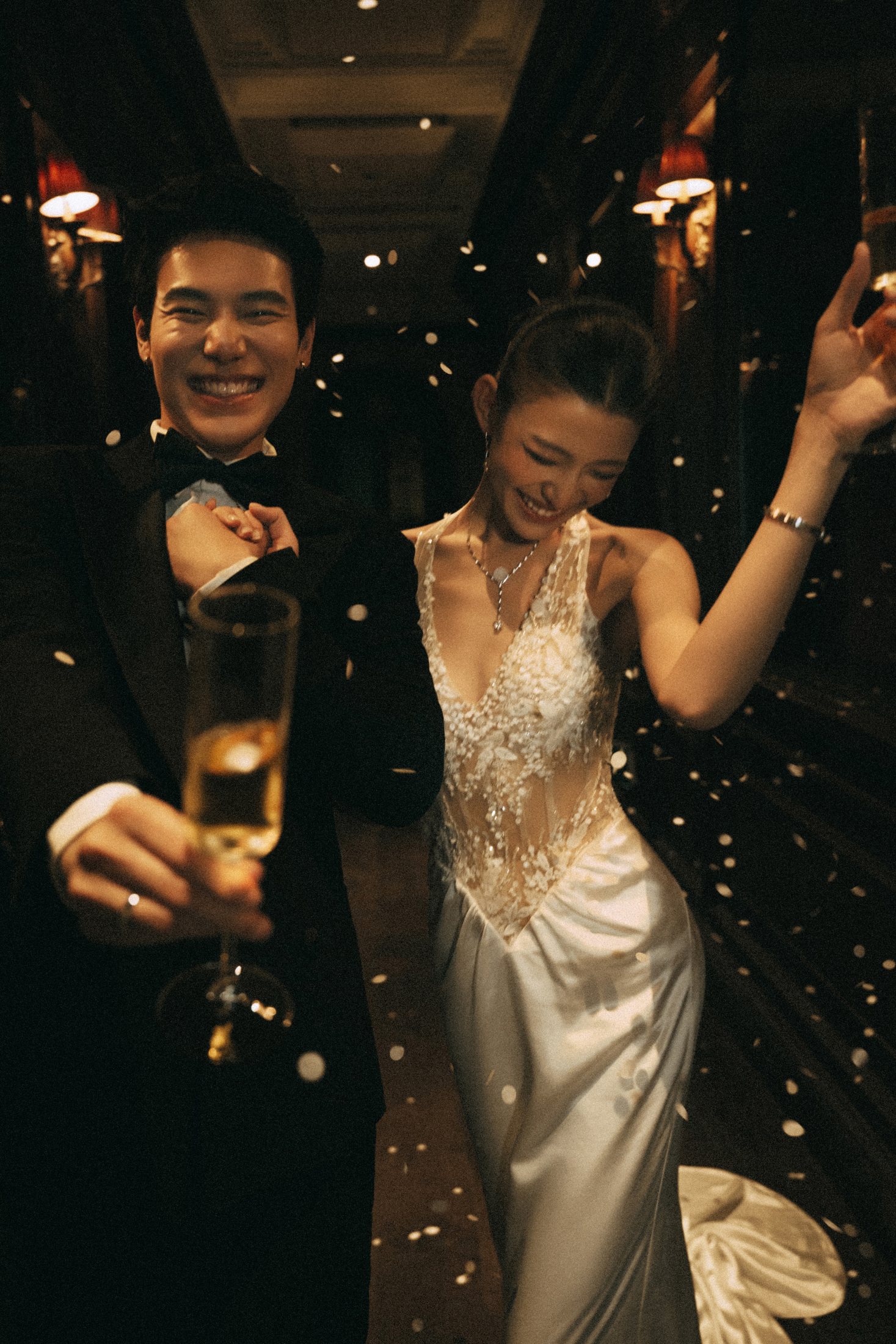 Newlyweds celebrating with confetti